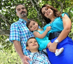 Anaelvys Espinoza-Ruiz with her husband Justo, son Justin and daughter Melanie.  Photo taken by Mabel Rodriguez and provided courtesy of Baptist Health International.